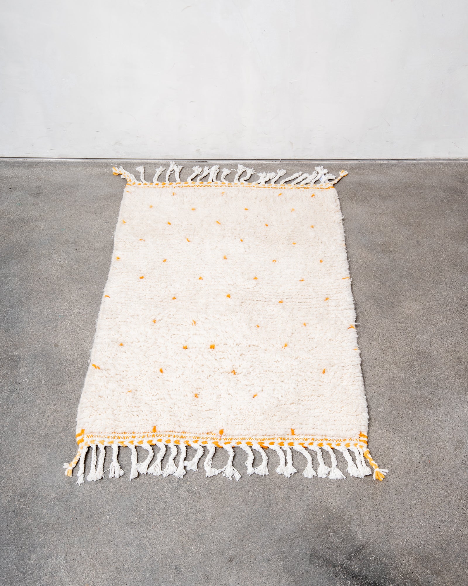 Modern, designer, handcrafted Berber rug from Morocco. Beniourain carpet with beautiful colours and patterns and fluffy wool texture.